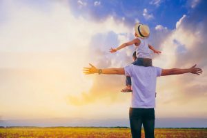 sitting-little-brother-riding-big-brothers-neck-looking-together-celebrate-their-freedom-farmland